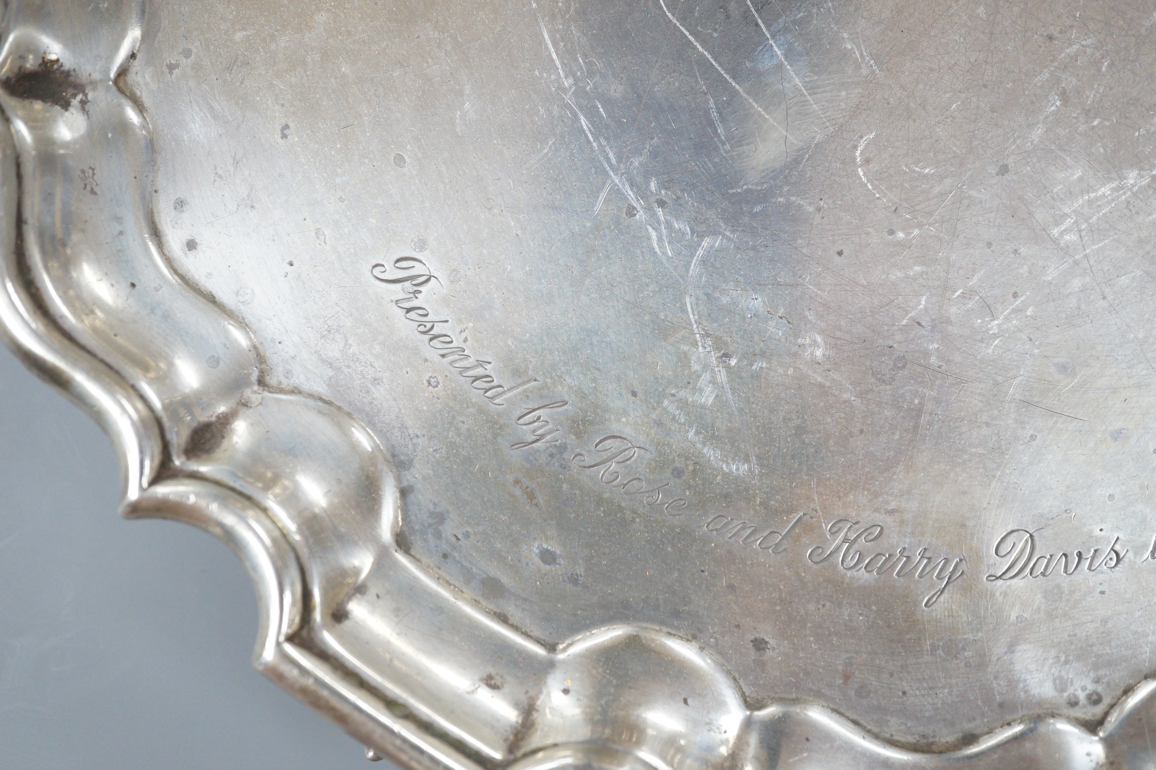 A late Victorian silver salver with later engraved inscription, Goldsmiths & Silversmiths Co Ltd, London, 1899, 25.7cm